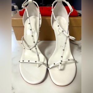 CHRISTIAN LOUBOUTIN
Riojana Red Sole Spike Stiletto Sandals